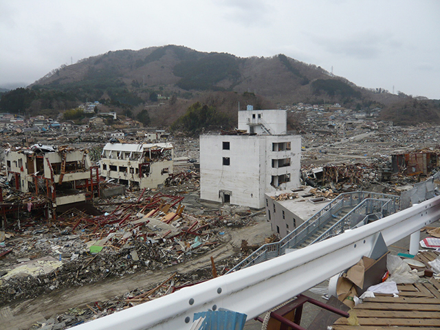 Damage / Sakuragaoka in the back of photo